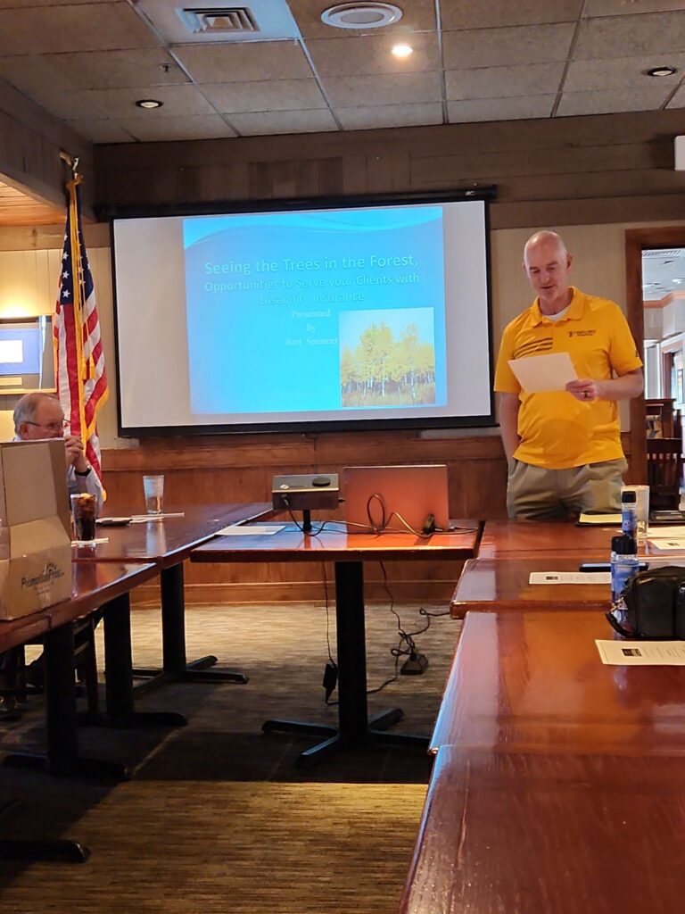 Anthony Taylor introducing Bart Spencer presenting “Seeing the Trees in the Forest” at What’s Working Wednesday.